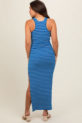 woman wearing a blue and white striped maternity maxi dress with a sleeveless design and side slits