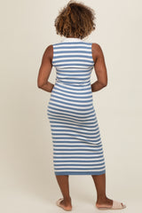woman wearing a blue and white striped sleeveless midi dress, view of the back with a form-fitting silhouette
