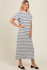 woman wearing a white and navy striped maxi dress with short sleeves and a relaxed fit