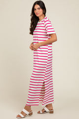 woman wearing a pink and white striped maxi dress with short sleeves and side slits