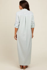 woman wearing a light green and white striped long maternity dress with rolled up sleeves and a button-down back