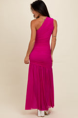 woman wearing a hot pink one-shoulder maxi dress with ruched detailing and a flowing skirt