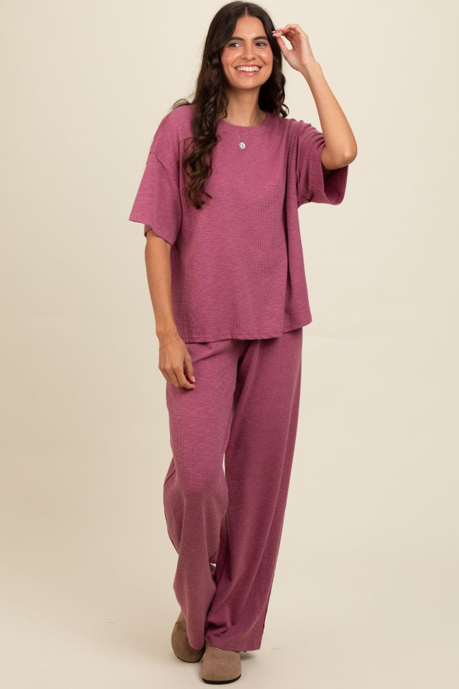 woman wearing a mauve oversized short sleeve t-shirt and matching wide-leg pants