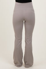 maternity wear light gray flared yoga pants with a high waistband, shown from the back