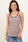 woman wearing a light pink and black striped tank top with button details and a fitted silhouette