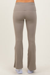 woman wearing light gray flared workout leggings viewed from the back