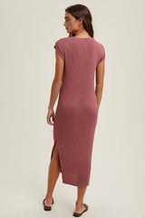 woman wearing a mauve ribbed maxi dress with short sleeves and side slits