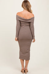 woman wearing a long-sleeve off-the-shoulder striped midi dress with a fitted silhouette and slit sleeves