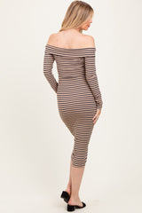 woman wearing a striped off-the-shoulder maternity dress with long sleeves, showing a fitted silhouette