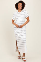 woman wearing a white striped maxi dress with short sleeves and a side slit