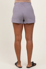 maternity wear light purple shorts with an elastic waistband, shown from the back