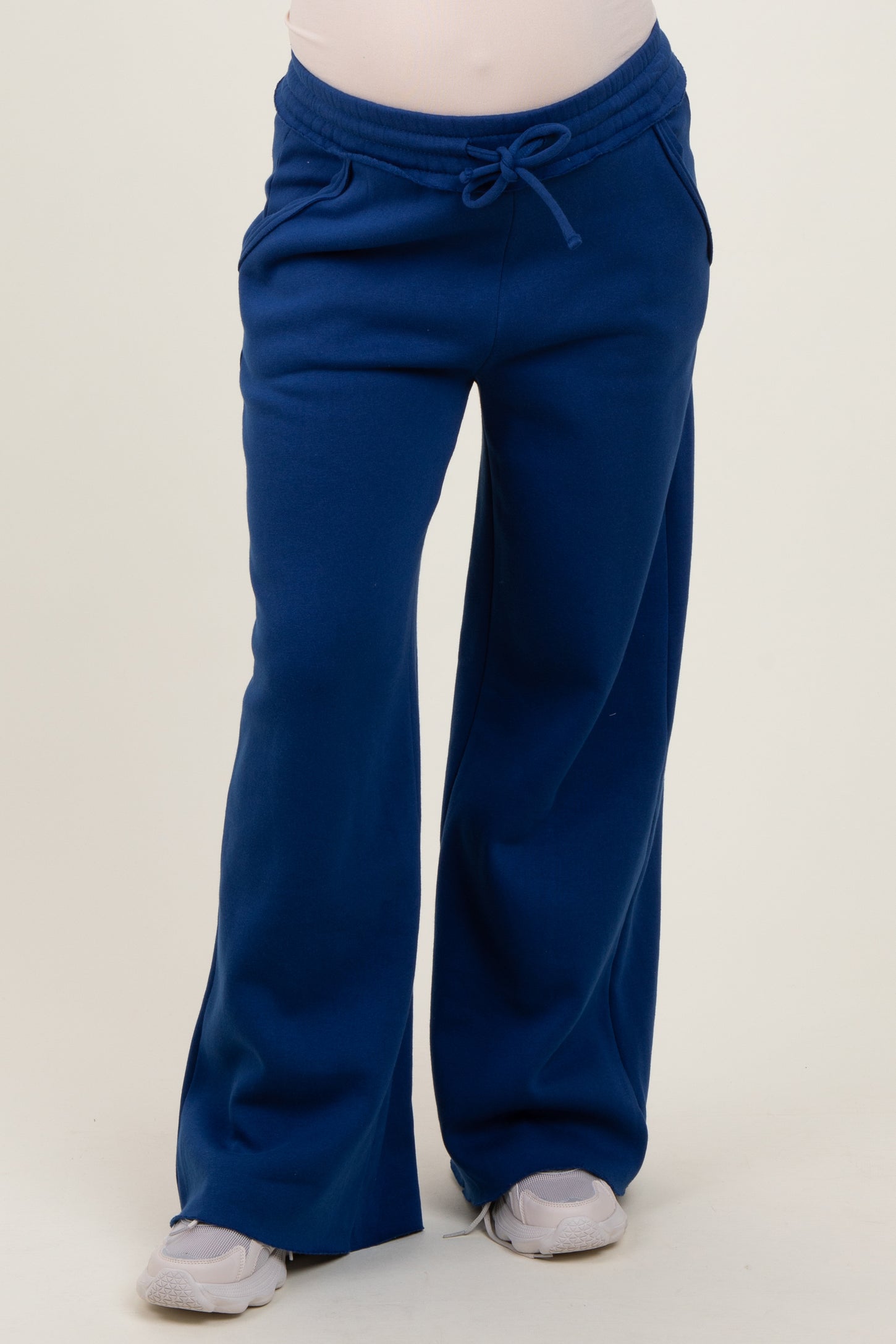 maternity wear in dark blue relaxed fit sweatpants with a drawstring waist and pockets