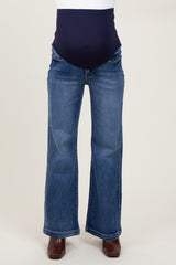 maternity wear dark blue flare jeans with a high waistband designed for comfort during pregnancy