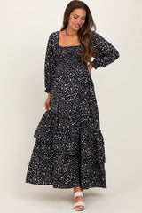 maternity wear black floral maxi dress with long sleeves and tiered skirt