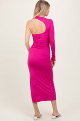 woman wearing a fitted hot pink dress with one long sleeve and a cutout back detail