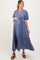 woman wearing a blue floral maternity wrap dress with short sleeves and a tie waist, showing her baby bump