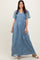 woman wearing a blue maxi dress with embroidered floral details and short flutter sleeves