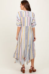 woman wearing a multi-colored striped maxi dress with a high-low hem and short sleeves, shown from the back