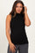 woman wearing a black sleeveless maternity top with a high neck and ribbed texture