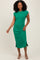 woman wearing a green sleeveless midi dress with side slits and a relaxed fit