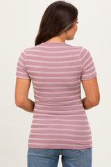 woman wearing a mauve and white striped maternity top, showing the back view with short sleeves and a fitted style