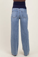 maternity wear wide leg light blue jeans with a mid-rise waistband, shown from the back