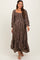 woman wearing a brown floral maternity maxi dress with a square neckline and puff sleeves