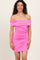 woman wearing a bright pink off-the-shoulder ruched mini dress with a fitted silhouette
