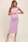 woman wearing a light purple ribbed maternity midi dress and holding her baby bump
