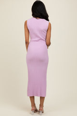 woman wearing a lavender sleeveless ribbed midi dress, back view, with a fitted silhouette and a side slit