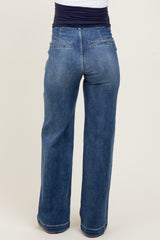 woman wearing blue wide leg maternity jeans with a stretchy waistband, back view