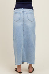 maternity wear light blue denim maxi skirt with a frayed hem, worn by a model from the back