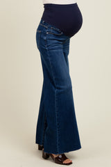 maternity wear flared dark denim jeans with a stretchy navy waistband and visible baby bump