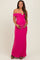 woman wearing a bright pink off-the-shoulder maternity dress, holding her baby bump