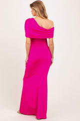 woman wearing a hot pink off-the-shoulder maternity dress with ruched detailing, showcasing a smooth silhouette