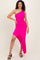 woman wearing a hot pink one-shoulder asymmetrical dress with ruching and a ruffled hem, posing confidently
