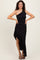 woman wearing a black one-shoulder dress with ruching and a ruffled asymmetrical hemline