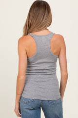 woman wearing a grey ribbed maternity tank top, showing the back view