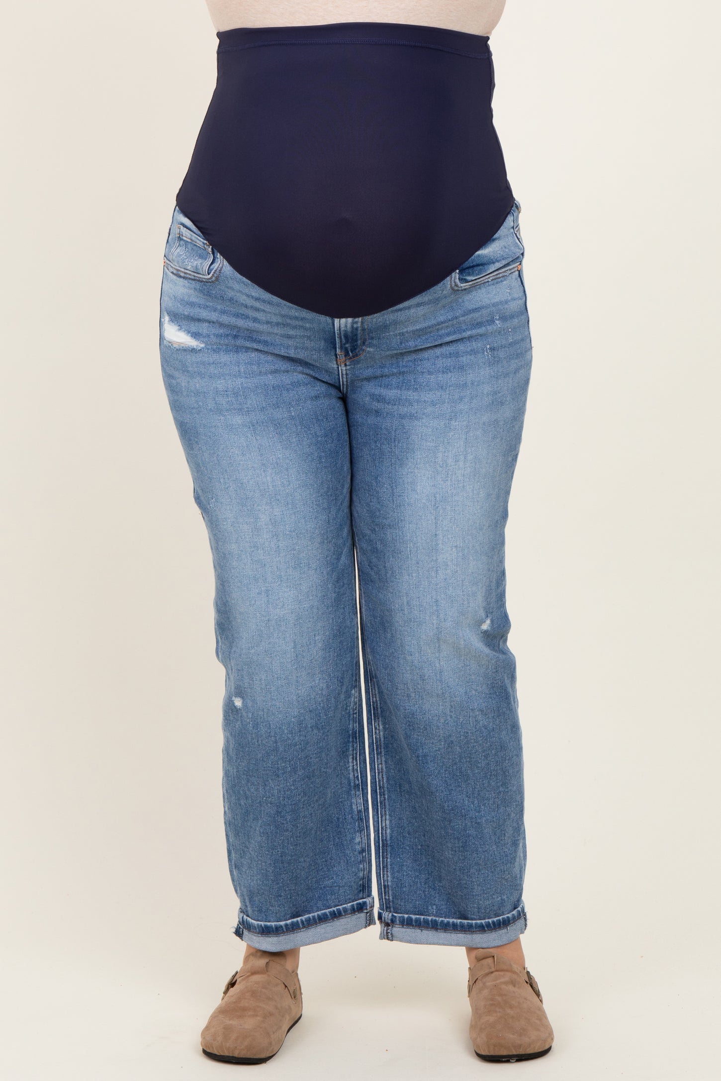maternity plus dark navy high-waisted denim jeans with distressed detailing, worn by a model with a visible baby bump