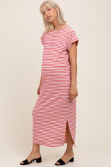 woman wearing a striped maternity maxi dress with short sleeves and a side slit, showcasing her baby bump