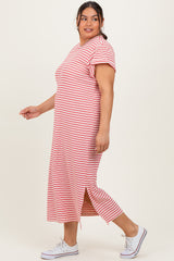 woman wearing a striped red and white maxi dress with short sleeves and a side slit, paired with white sneakers