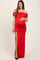 woman wearing a red off-the-shoulder maternity dress with ruching and a side slit, showcasing her baby bump