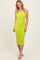 woman wearing a bright lime green ruched midi dress with a strapless design and a fitted silhouette