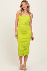 woman wearing a bright green fitted strapless midi dress with ruched detailing