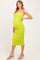 woman wearing a bright green ruched maternity dress with spaghetti straps and a visible baby bump
