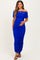 woman wearing a royal blue off-shoulder maternity dress with ruched details and a visible baby bump