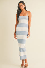 woman wearing a blue and white striped ribbed maxi dress with thin straps