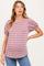 woman wearing a striped short sleeve maternity top with pleated sleeves and a visible baby bump