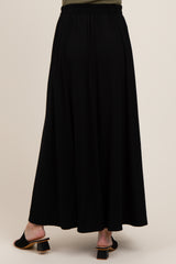 maternity wear black maxi skirt with an elastic waist, shown from the back