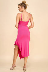 woman wearing a hot pink midi dress with adjustable spaghetti straps and a ruffle hem, viewed from the back
